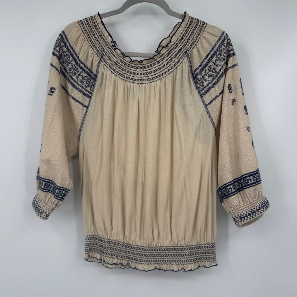 Free people woman’s size medium off shoulder smocked neckline embroidered detail